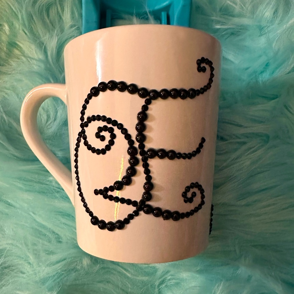 Personalized mug with stones.